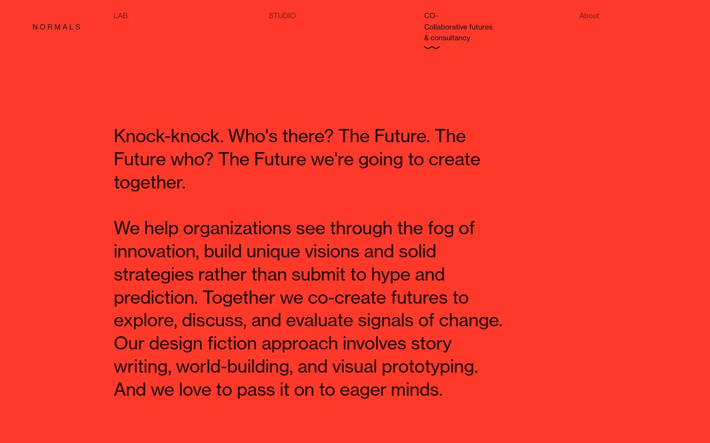 A minimalist website with a vibrant red background and black text. The layout features a large headline followed by descriptive paragraphs about co-creating futures through design fiction. Navigation links like LAB, STUDIO, and CO are spread across the top, and the design uses ample white space and bold typography.