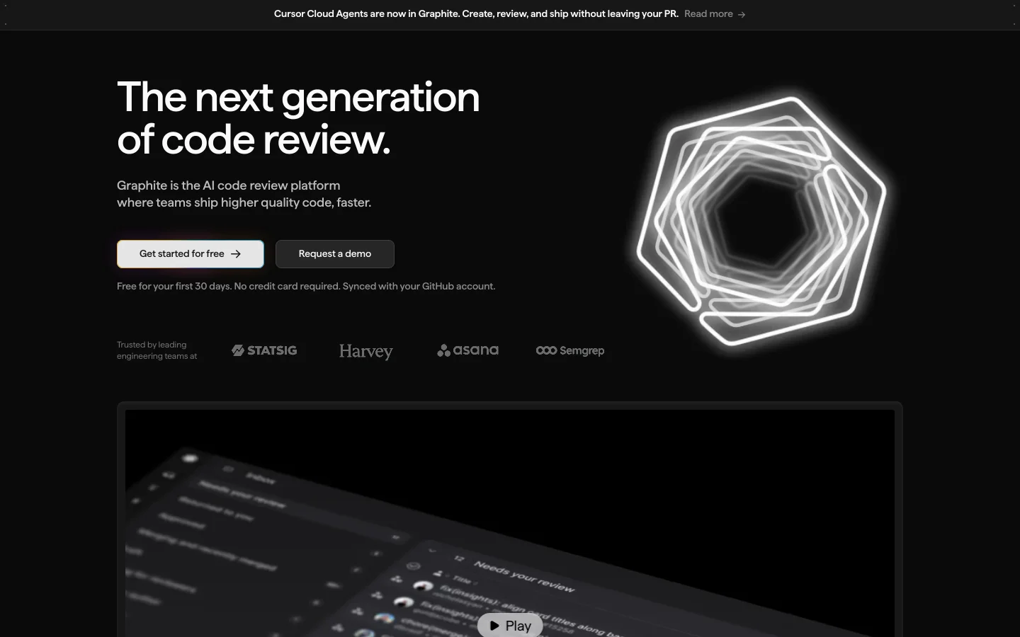 The Graphite homepage features a dark theme with a large headline reading 'The next generation of code review.' A glowing white hexagonal graphic sits to the right of the hero text, which includes 'Get started for free' and 'Request a demo' buttons. Below the hero section, a row of company logos is displayed, followed by a large video thumbnail showing the Graphite interface.