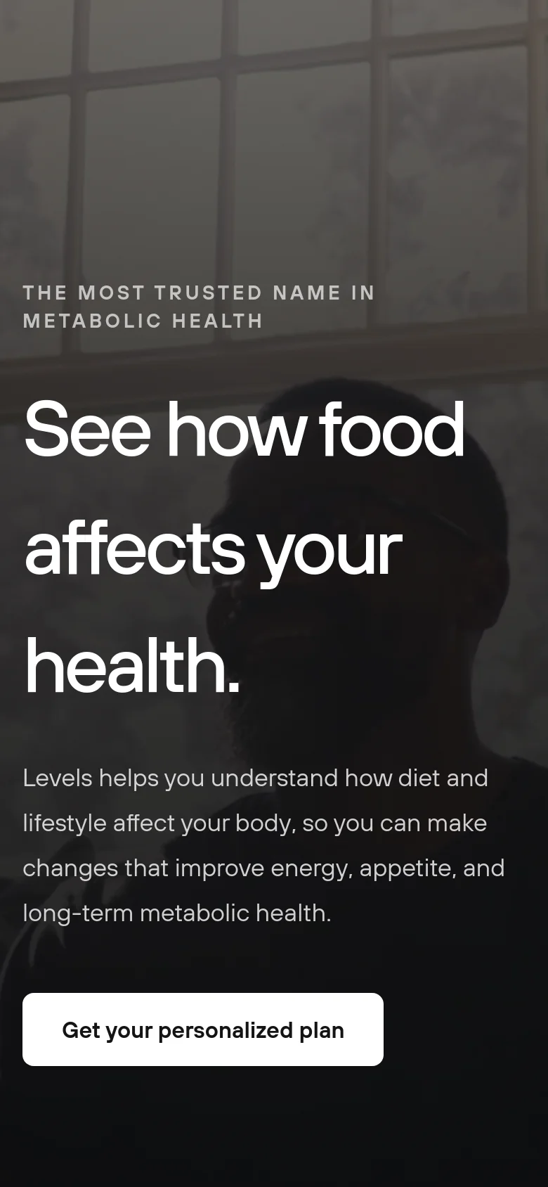 The mobile version presents a vertically stacked layout optimized for small screens, maintaining the dark hero image and prominent white headline. The call-to-action button is centered and spans a significant width of the screen for easy tapping, with text and content sections condensed into a single-column scroll.