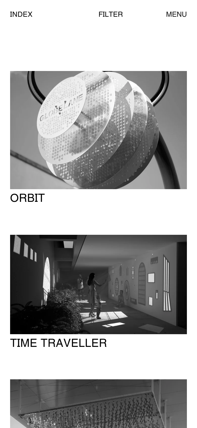 The mobile version maintains the bright orange header and white logo but collapses the navigation into a simplified layout. The project gallery shifts from a multi-column grid to a single-column vertical scroll, focusing on large, full-width black and white imagery and project titles.