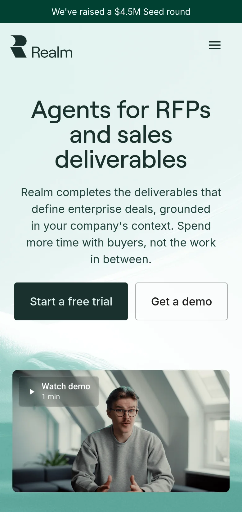 The mobile version presents a vertically stacked layout with the headline and subtext centered at the top. The 'Start a free trial' and 'Get a demo' buttons are large and stacked for easy tapping, followed by the video thumbnail. The navigation menu is condensed into a hamburger icon in the top right corner.