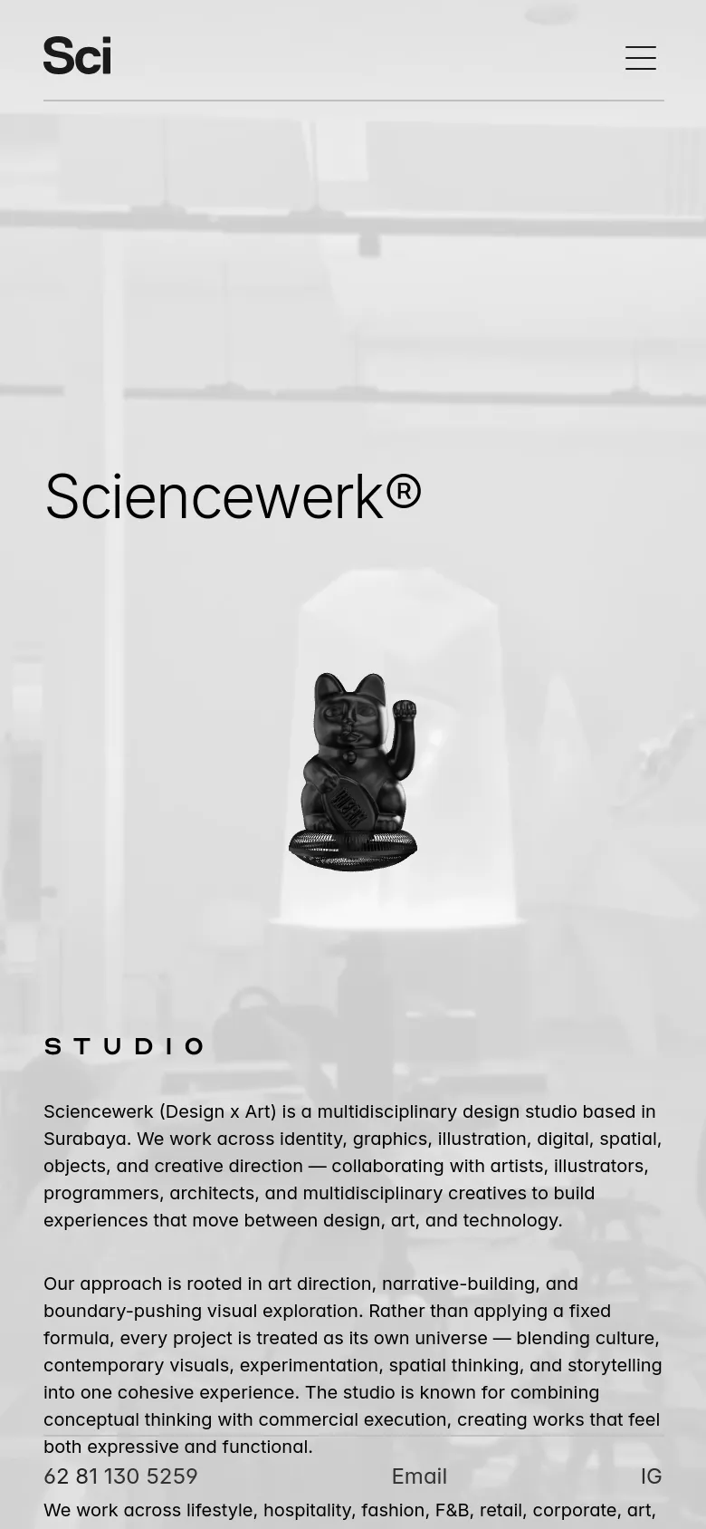 Mobile version of the Sciencewerk About page with a simplified layout. The top navigation is condensed into a 'Sci' logo and a hamburger menu icon. The hero section maintains the 'Sciencewerk®' title and cat figurine over a light gray background, followed by the studio description and contact information stacked vertically.