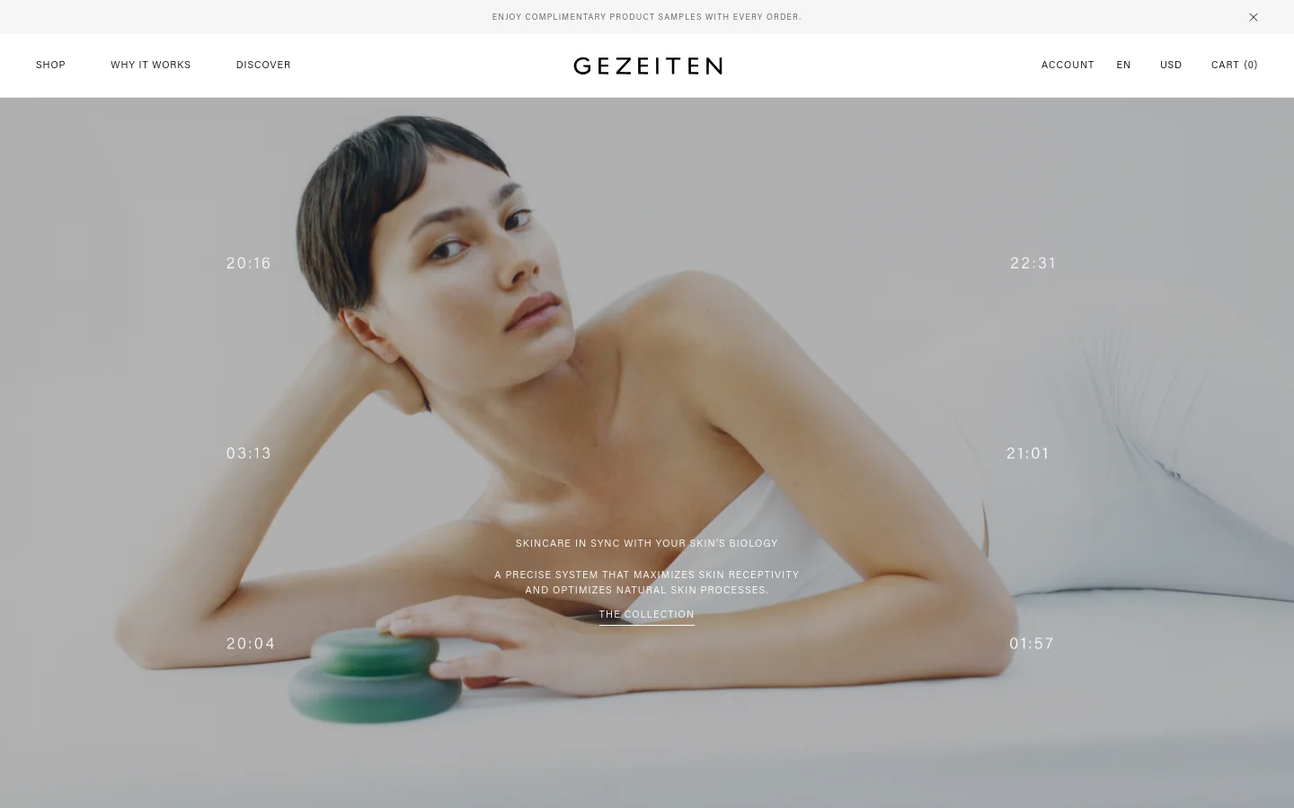 The desktop homepage features a minimalist, high-end aesthetic with a large hero image of a person lying down against a neutral background, overlaid with digital time stamps and the headline 'SKINCARE IN SYNC WITH YOUR SKIN'S BIOLOGY'. A navigation bar at the top includes links for Shop, Why It Works, and Discover, with a call to action button labeled 'THE COLLECTION' centered below the text. The color palette is composed of soft, muted earth tones and whites.