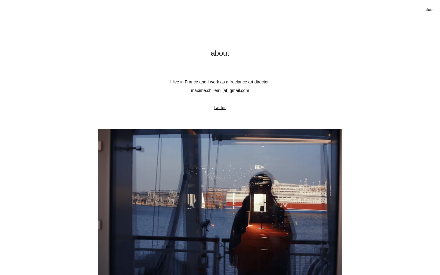 The About page features a minimalist white layout with centered black text stating the user is a freelance art director in France. Below the contact information is a large, cinematic photograph of a person's silhouette reflected in a window overlooking a harbor with a large ship. Navigation links for design and photography are visible at the top.