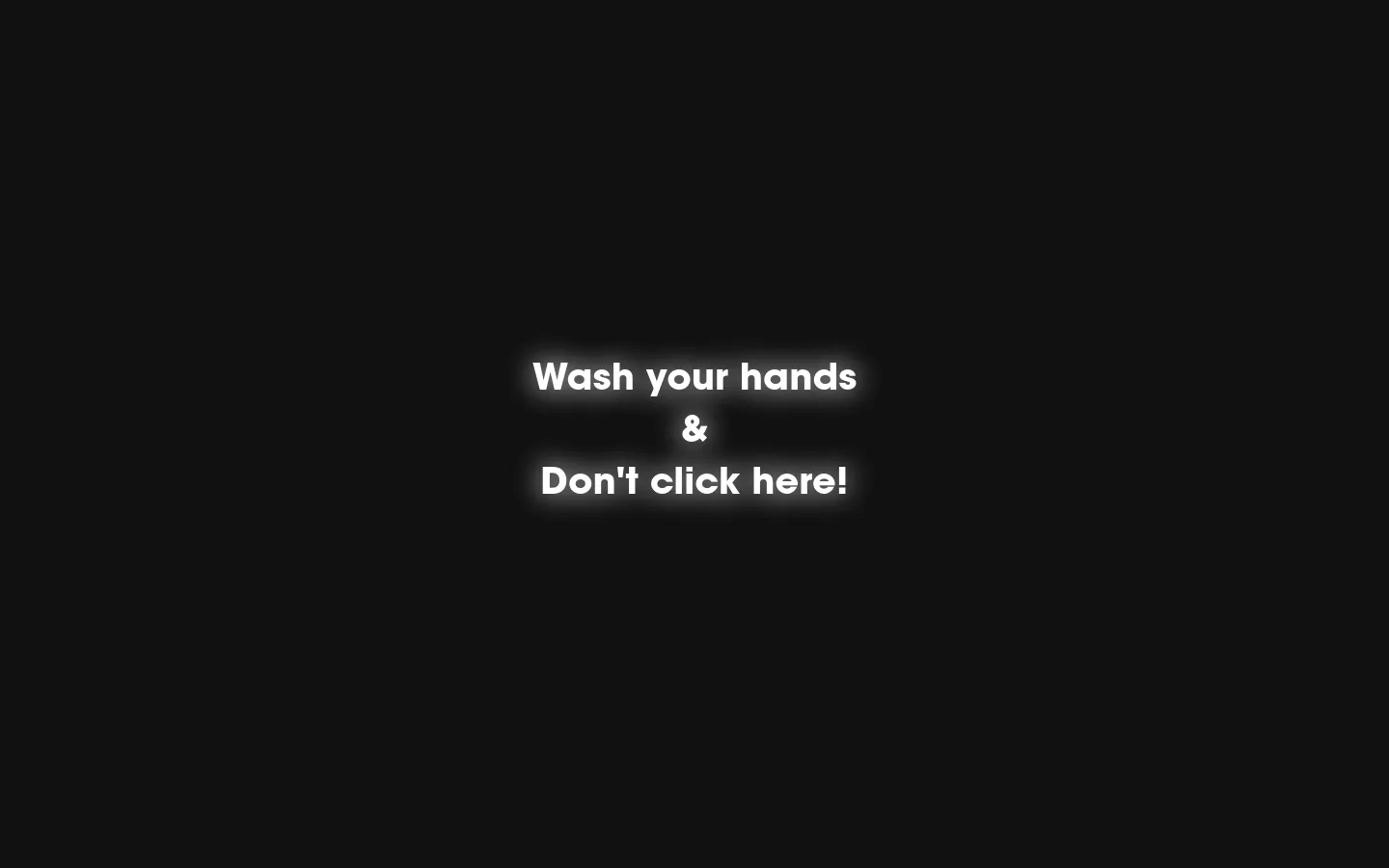 The desktop page features a minimalist black background with white text. Centered prominently are the provocative headlines 'Wash your hands & Don't click here!' in a stylized font.