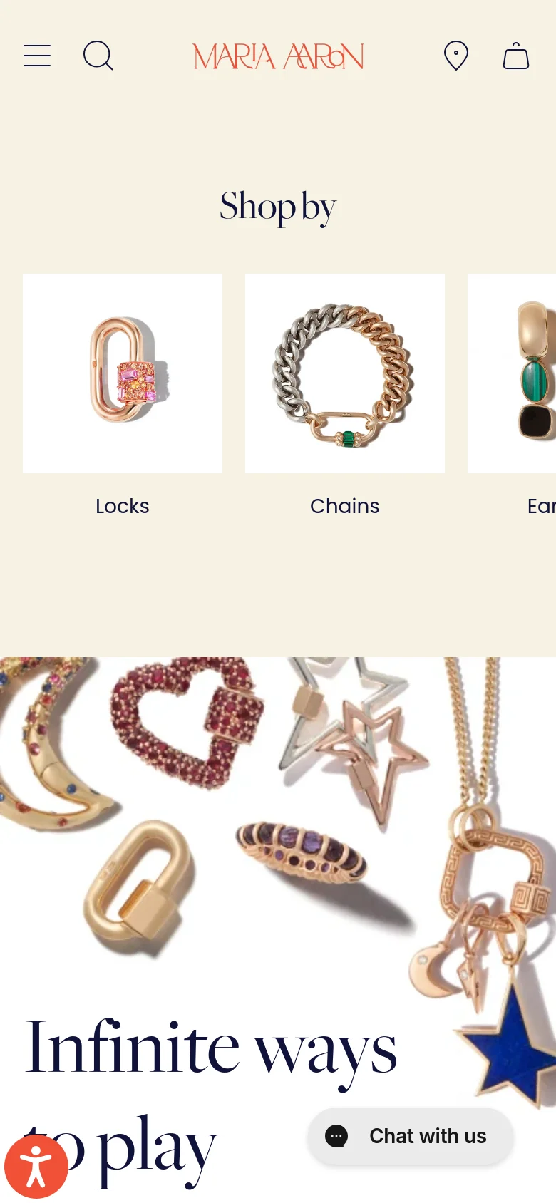 The mobile version presents a vertically stacked layout with the 'Shop by' section showing a single row of large, touch-friendly category tiles for Locks, Chains, and Earrings. The navigation is condensed into a hamburger menu and search icon at the top, while the bottom features a large, colorful banner of various jewelry pieces with a 'Chat with us' button.
