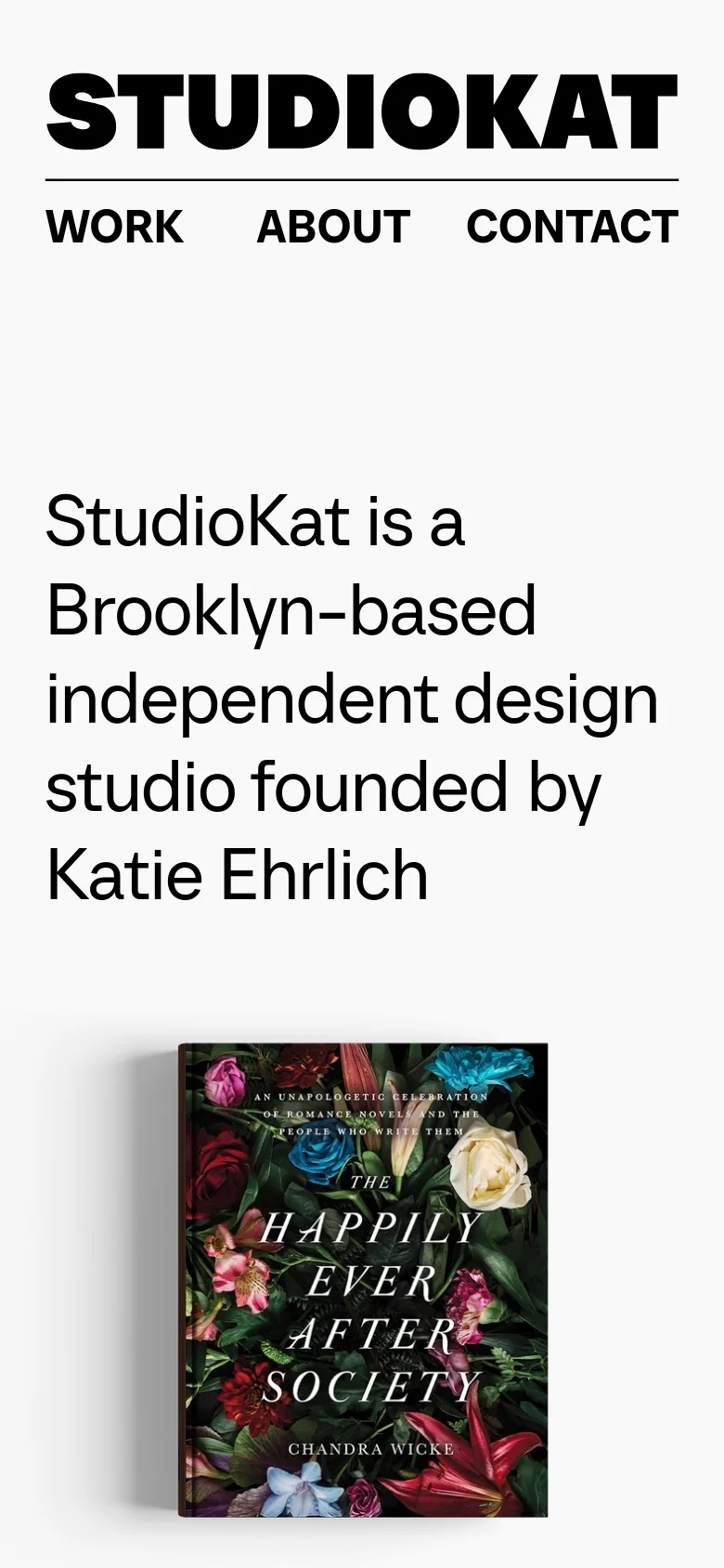 The mobile version displays a centered, large StudioKat logo with navigation links stacked below it. The introductory text about the Brooklyn-based design studio is prominently centered, followed by a large, colorful book cover image as the primary visual element.
