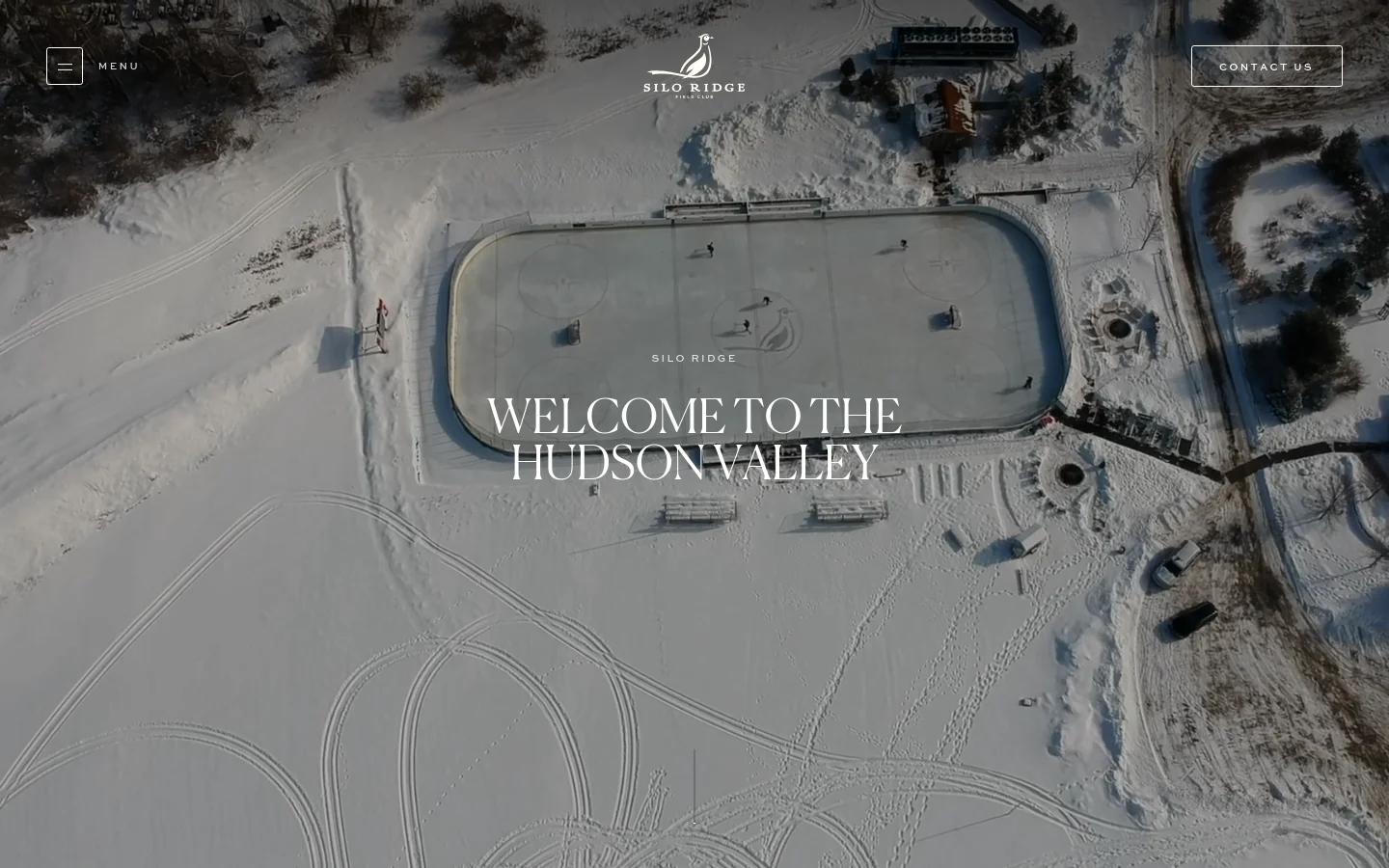 The desktop homepage features a full-width aerial hero image of a snow-covered landscape with an ice rink, overlaid with the text 'WELCOME TO THE HUDSON VALLEY'. A minimalist navigation bar at the top includes a 'MENU' button on the left, the Silo Ridge Field Club logo in the center, and a 'CONTACT US' button on the right.