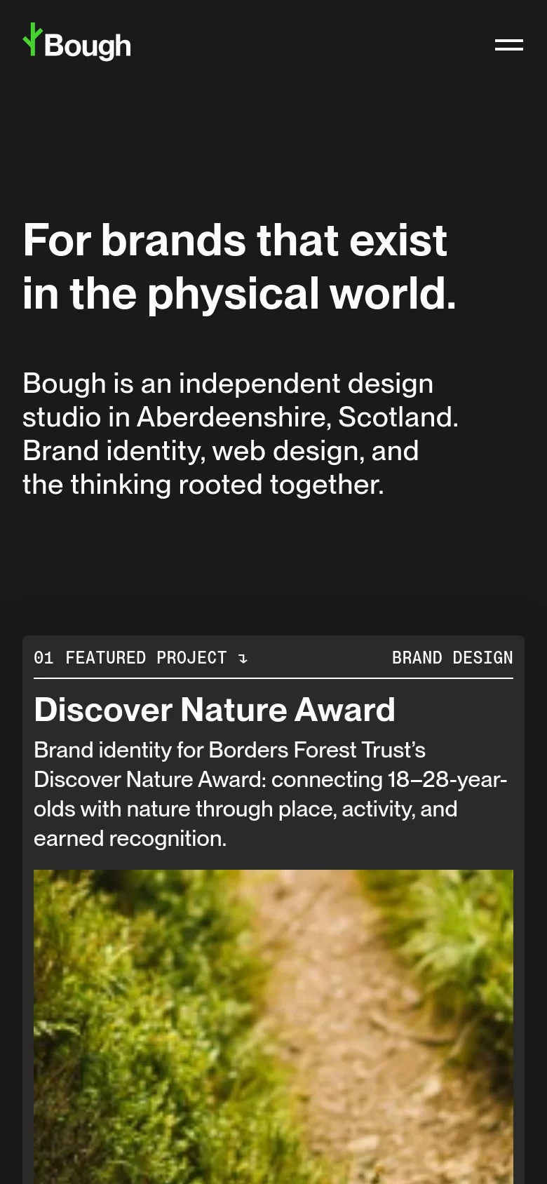 The mobile version maintains the dark theme and minimalist aesthetic but uses a condensed layout. The navigation menu is replaced by a hamburger icon, and the hero text is centered and scaled for smaller screens. Project sections are stacked vertically, focusing on large imagery and clear text descriptions.