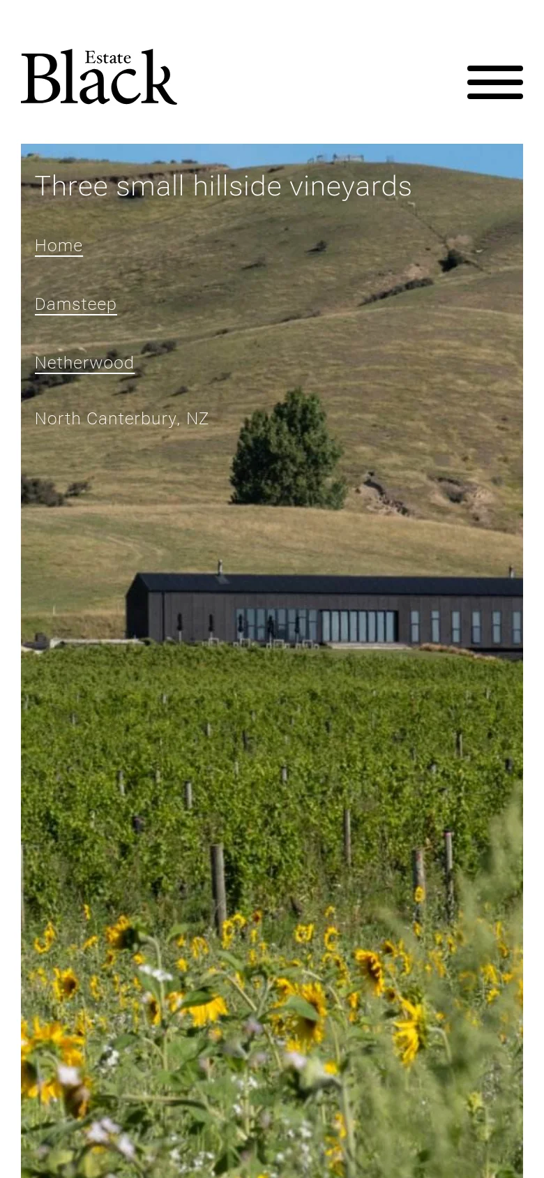 The mobile version shows the same sunflower and vineyard landscape, but the navigation menu is collapsed into a hamburger icon at the top right. The text 'Three small hillside vineyards' and the site links are stacked vertically on the left side of the screen, occupying the upper portion of the image.