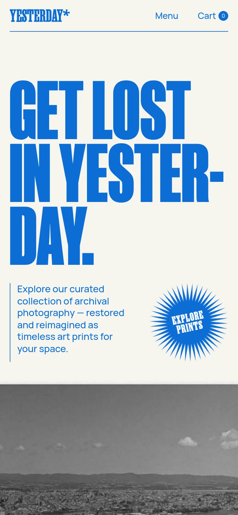 The mobile version displays a vertically stacked layout with the large blue 'GET LOST IN YESTERDAY.' headline at the top. Below the headline, the descriptive text and the blue 'EXPLORE PRINTS' sunburst graphic are centered, followed by a black and white archival landscape photograph at the bottom. The header is simplified to include the logo, a 'Menu' link, and a 'Cart' icon.
