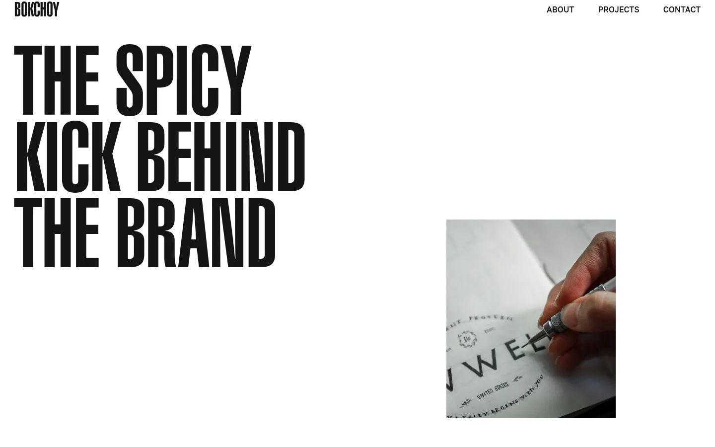 The desktop About page features a minimalist white background with a large, bold black headline reading 'THE SPICY KICK BEHIND THE BRAND.' A navigation menu is at the top right, and a rectangular image on the right shows a close-up of a hand sketching in a notebook with a pen.