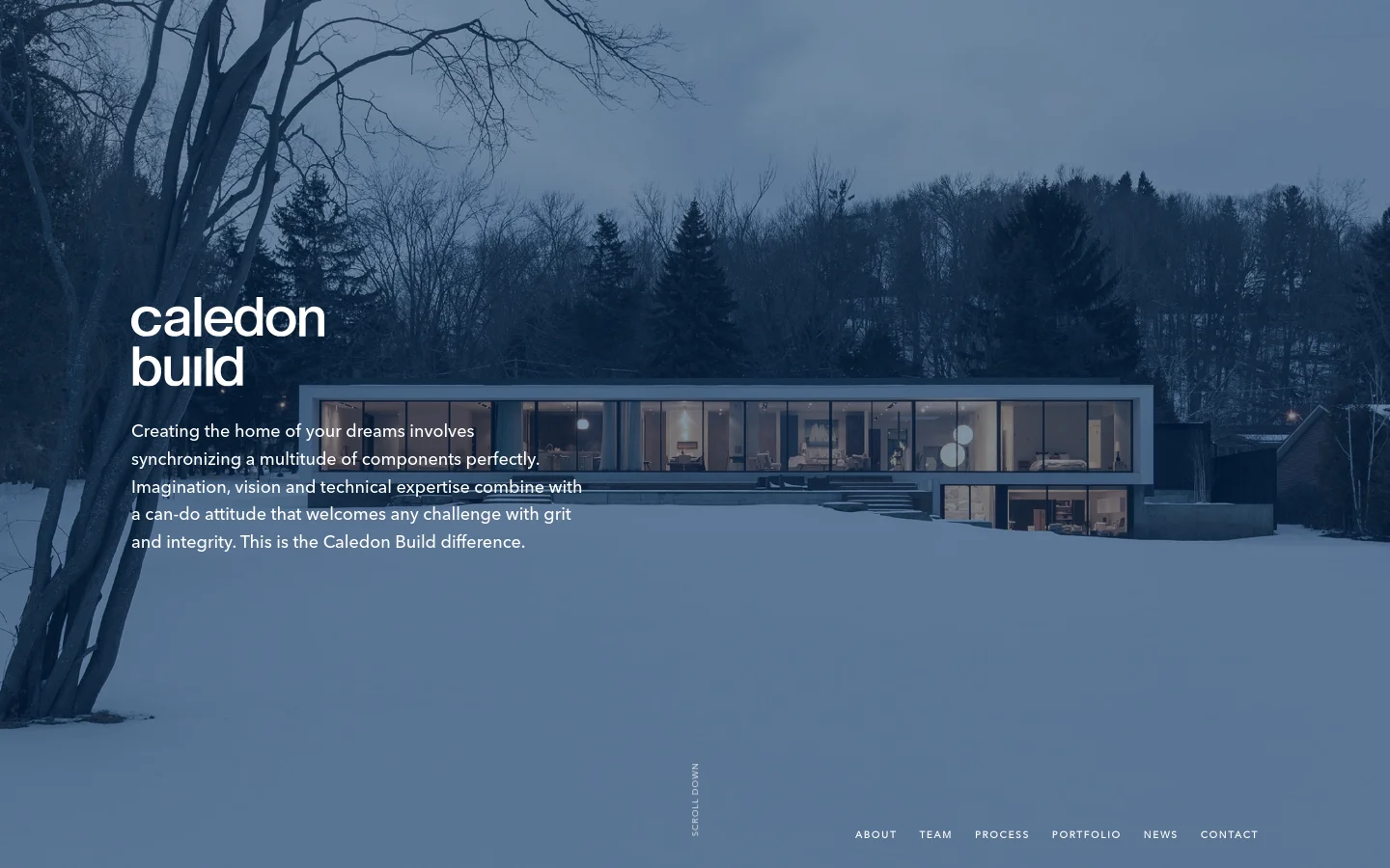 The desktop homepage features a full-screen hero image of a modern house in a snowy landscape under a blue twilight sky. The Caledon Build logo and a mission statement are overlaid on the left, with a navigation menu at the bottom right and a vertical 'Scroll Down' prompt.
