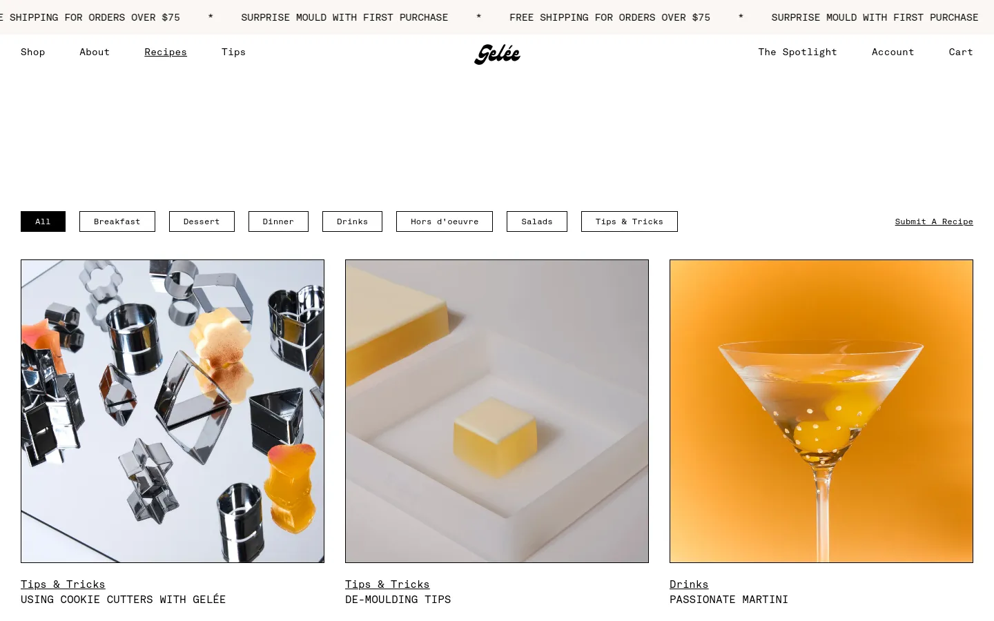 The Recipes page features a clean white layout with a navigation bar containing categories like Breakfast, Dessert, and Drinks. Below the category filter buttons, a grid of large, colorful recipe cards displays high-quality food photography, such as cookie cutters with gelée and a martini, each with a category label and title.