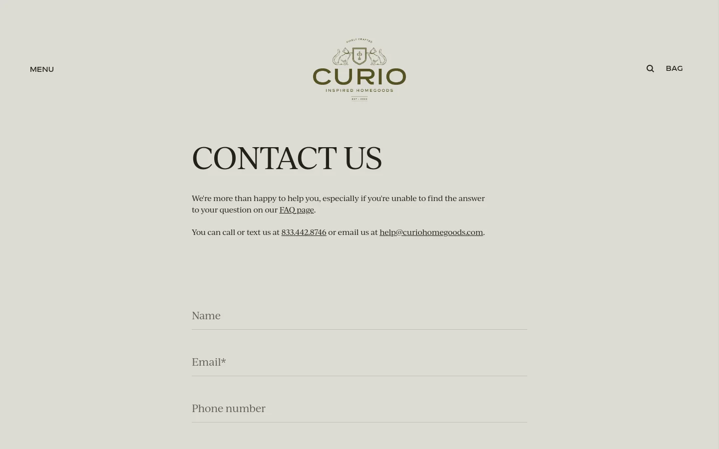 The desktop Contact Us page features a minimalist design with a light beige background and dark serif typography. The Curio logo is centered at the top, flanked by a menu link and a search icon with a bag link. Below the main 'CONTACT US' headline, there is introductory text, contact details, and a contact form with fields for Name, Email, and Phone number.