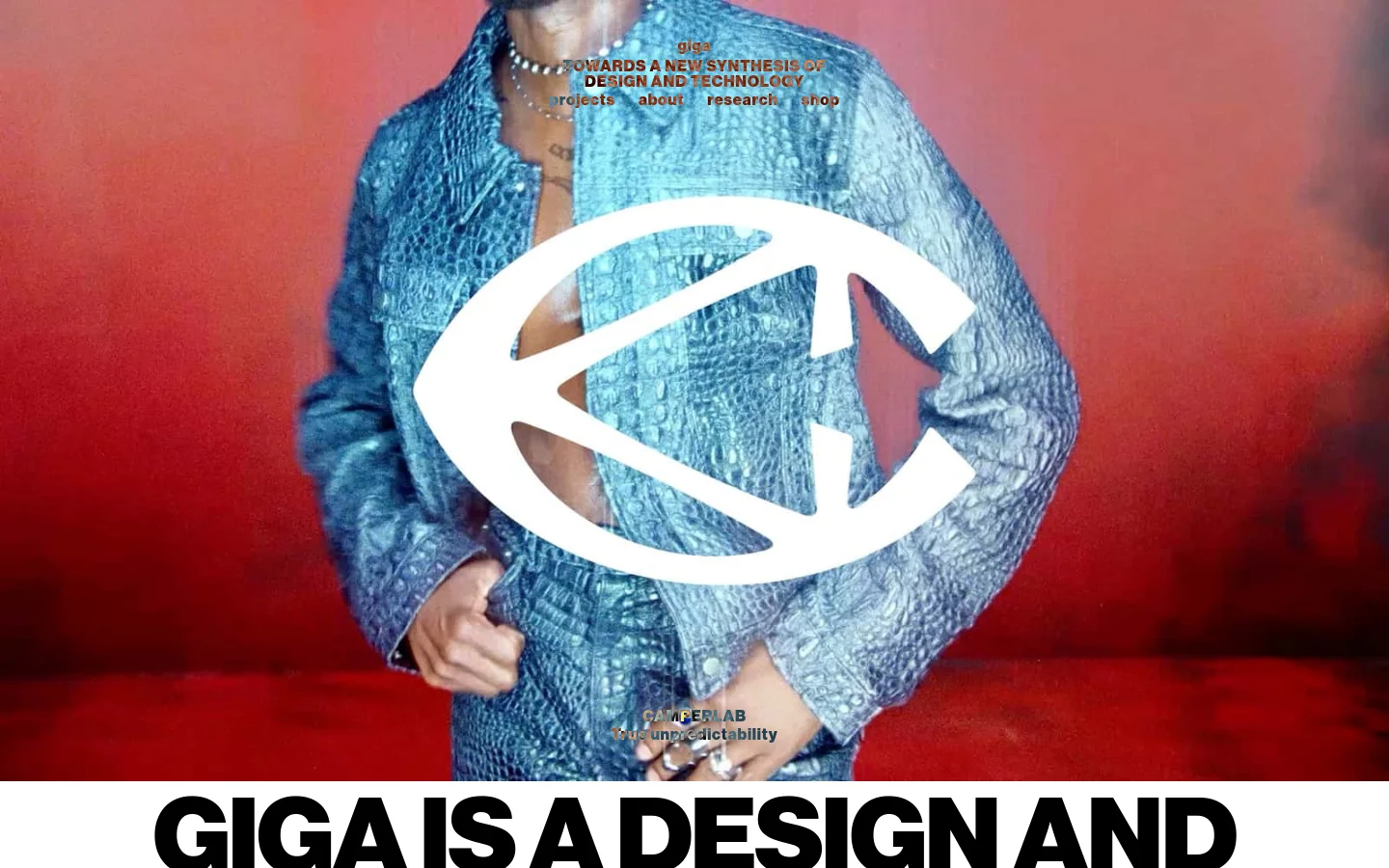 The desktop homepage features a large hero image of a person in a textured blue jacket against a red background, overlaid with a large white stylized 'G' logo and the headline 'TOWARDS A NEW SYNTHESIS OF DESIGN AND TECHNOLOGY'. A navigation menu with links for projects, about, research, and shop is positioned at the top, while the bold text 'GIGA IS A DESIGN AND TECHNOLOGY STUDIO' anchors the bottom section.