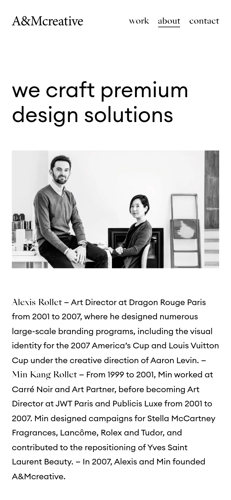The mobile version maintains the minimalist aesthetic but uses a stacked layout. The navigation links are positioned below the logo, and the large headline 'we craft premium design solutions' sits above a centered black and white hero image of the founders. The biographical text follows below the image in a single column.