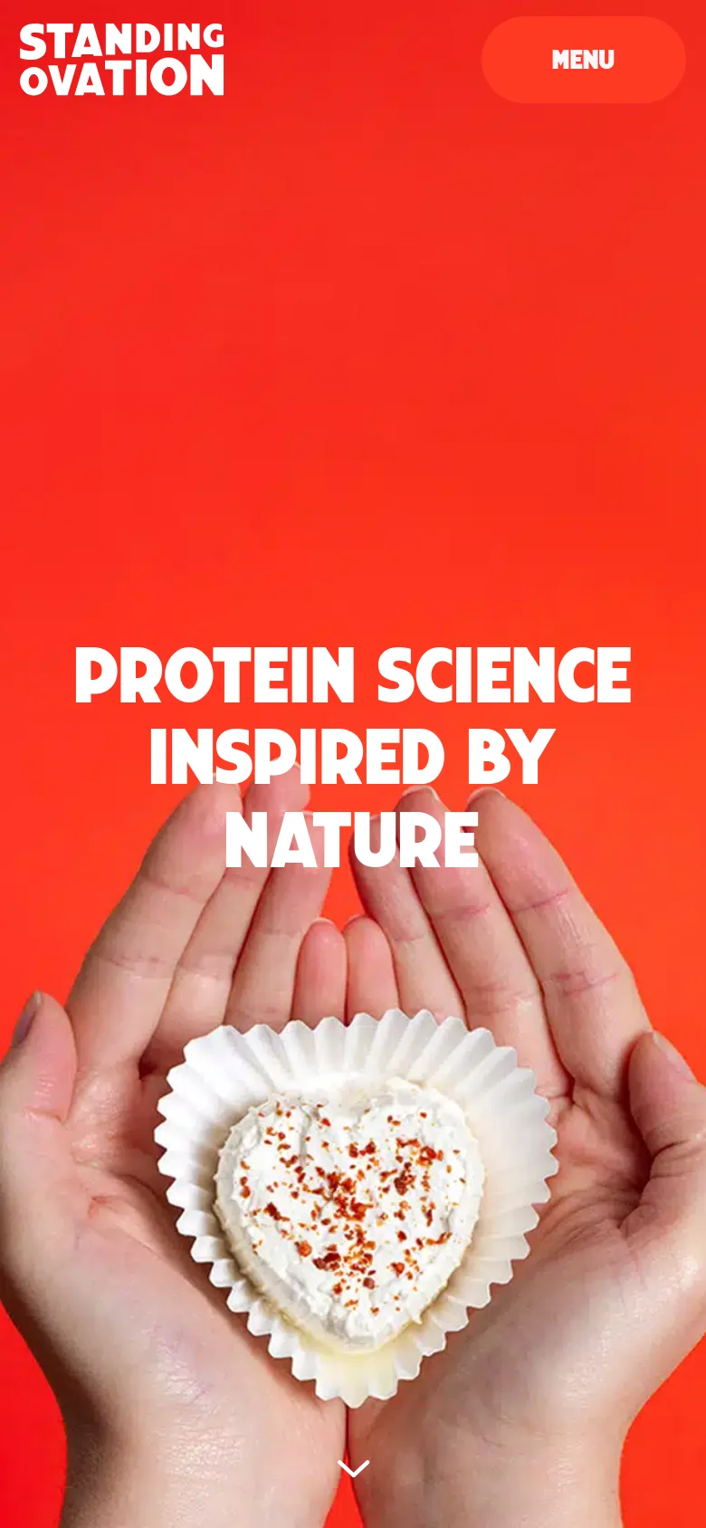 The mobile version displays a simplified layout with a large red hero section and the same 'PROTEIN SCIENCE INSPIRED BY NATURE' headline and hands holding a heart-shaped dessert. The top navigation is replaced by a 'MENU' button in an orange pill shape, and the Standing Ovation logo is positioned on the left.