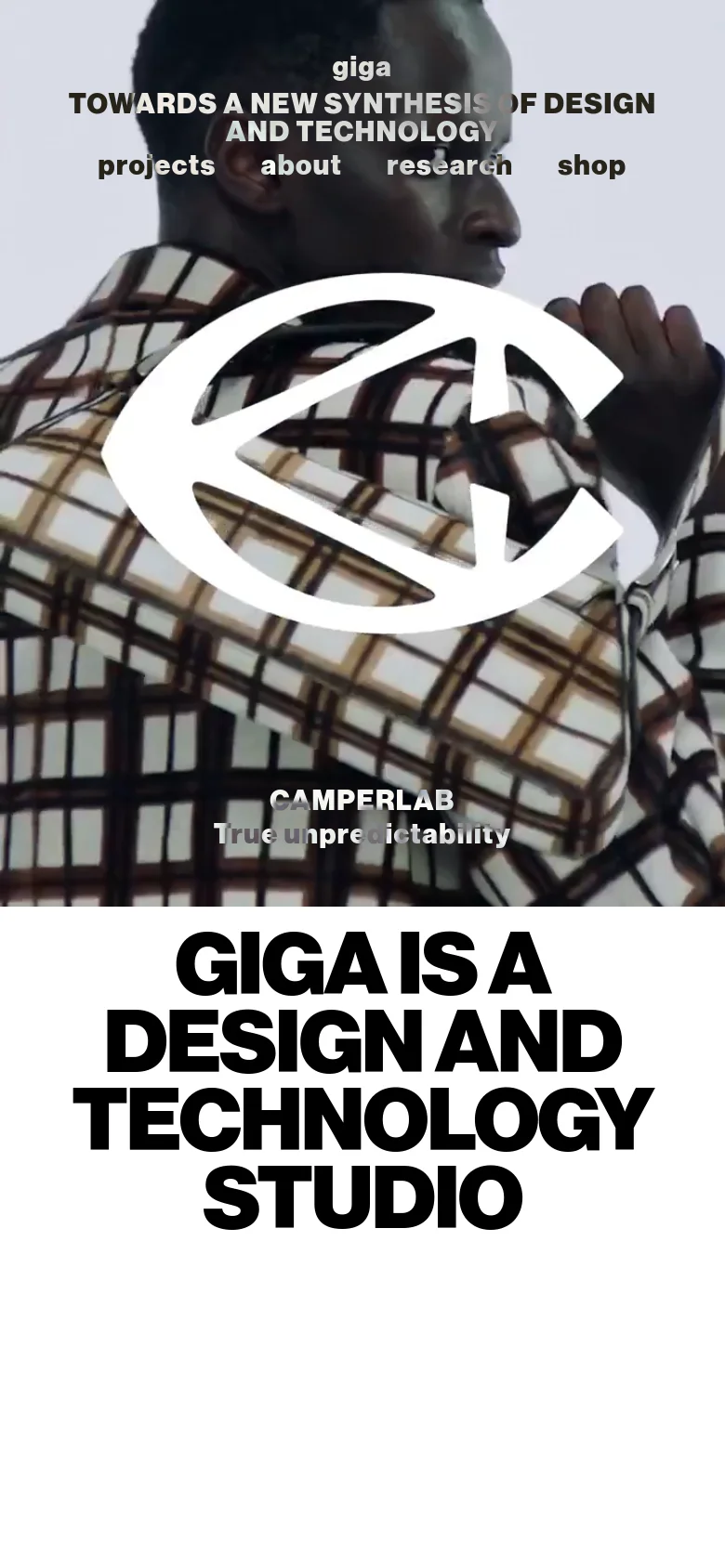 The mobile version maintains the same high-contrast aesthetic with a large hero image and bold typography, but the layout is vertically compressed. The navigation links are stacked or scaled for a smaller screen, and the primary headline 'GIGA IS A DESIGN AND TECHNOLOGY STUDIO' is prominently centered in large, black, sans-serif type against a white background.