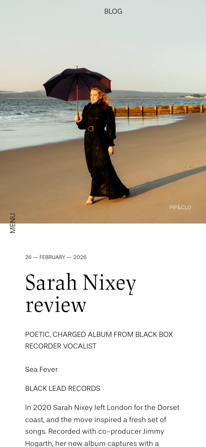 The mobile version uses a single-column vertical layout. The hero image of the woman on the beach spans the top of the screen, followed by the blog title, date, and the Sarah Nixey review headline and text below it.