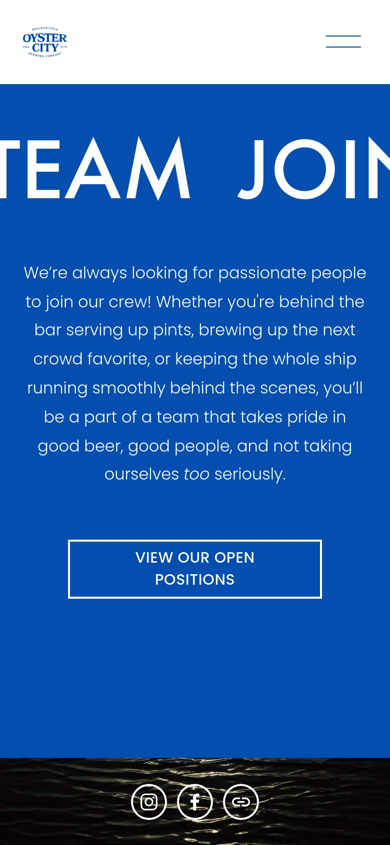 The mobile version maintains the blue hero section and centered white text, but the massive headline is scaled down to fit the narrow screen. The layout remains vertically stacked with the descriptive text and 'VIEW OUR OPEN POSITIONS' button centered, followed by the water-textured footer.