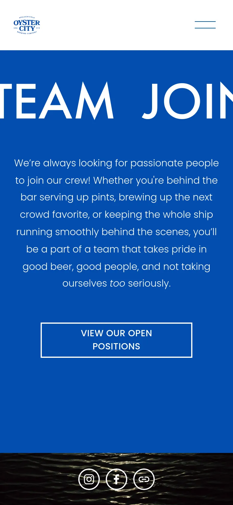 The mobile version maintains the blue hero section and centered white text, but the massive headline is scaled down to fit the narrow screen. The layout remains vertically stacked with the descriptive text and 'VIEW OUR OPEN POSITIONS' button centered, followed by the water-textured footer.