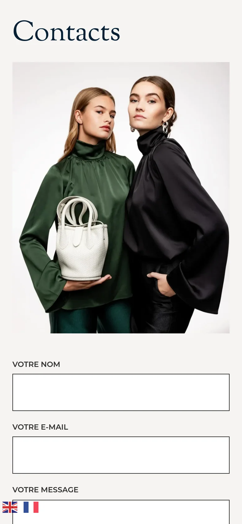 The mobile version stacks the content vertically, starting with the 'Contacts' heading followed by the large portrait image of the two models. Below the image, the contact form fields for name, email, and message are arranged in a single column for easy scrolling on a smaller screen.