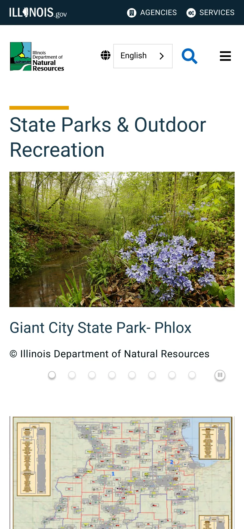 The mobile version simplifies the layout with a hamburger menu and a search icon at the top. The hero image of forest flowers and the 'State Parks & Outdoor Recreation' headline are stacked vertically, followed by the map which is positioned below the main image and text.