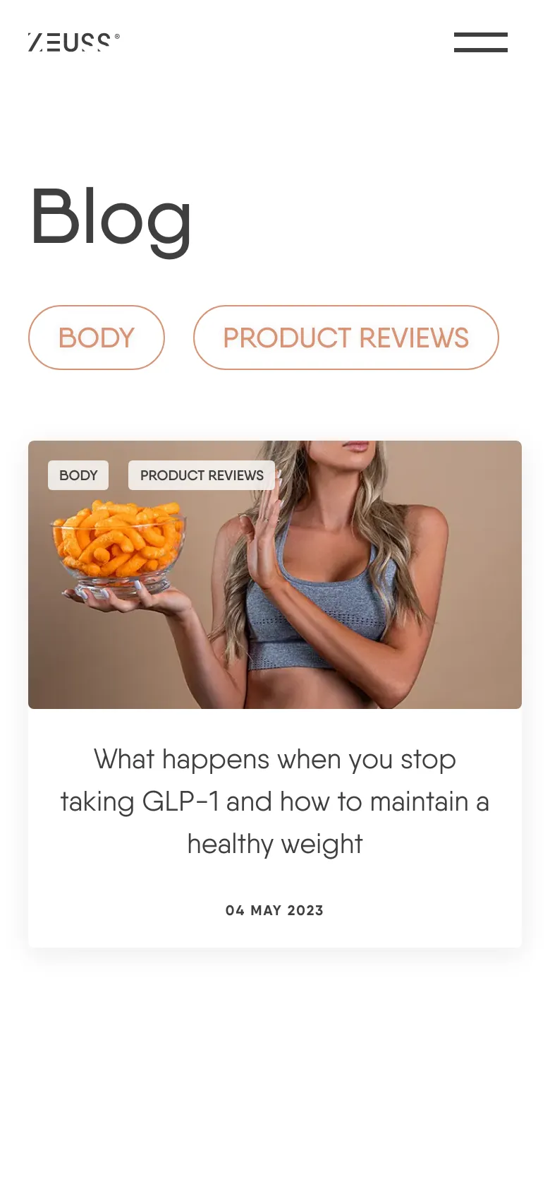 The mobile version simplifies the layout, displaying the 'Blog' title above two large, stacked pill-shaped buttons for 'BODY' and 'PRODUCT REVIEWS'. The featured article is presented as a vertical card with the image at the top, followed by the article title and date on a white background. The navigation menu is condensed into a hamburger icon in the top right corner.