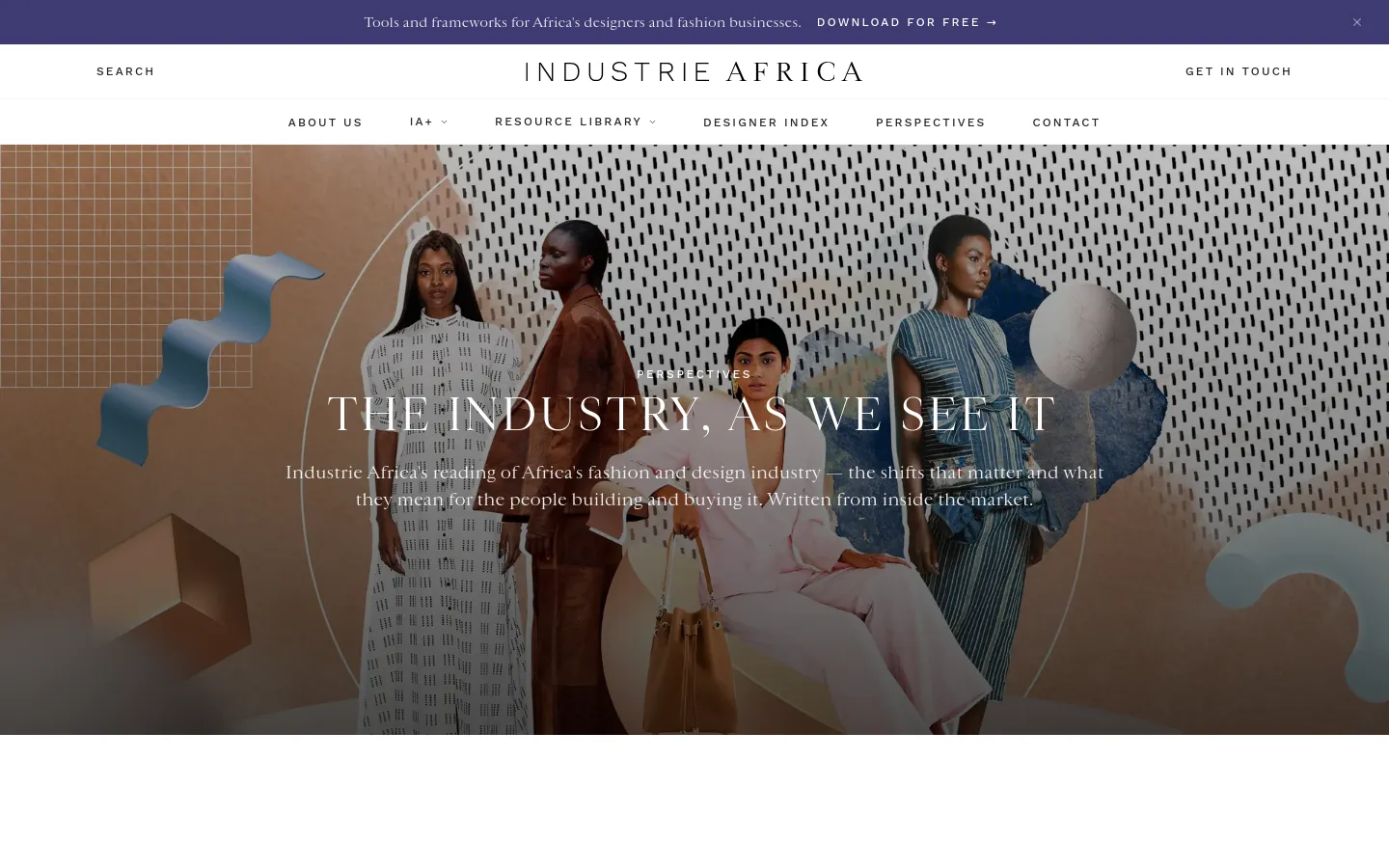 The desktop page features a large hero image of four models in stylish attire against an abstract, textured background with geometric shapes. Below the hero section, the headline 'The Industry, As We See It' introduces a grid of articles, each featuring a large high-quality image, a category tag, a title, and a 'Read More' call to action. The layout is clean with ample white space and a minimalist navigation menu at the top.