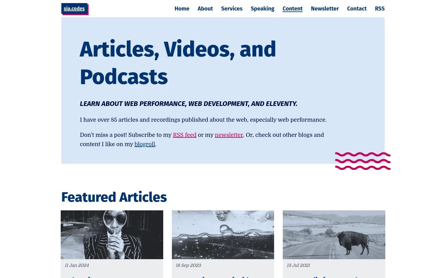 A desktop webpage titled 'Articles, Videos, and Podcasts' with a light blue hero section containing a headline, subheadline, and introductory text. Below the hero, a 'Featured Articles' section displays a grid of articles, each featuring a black and white thumbnail image, a date, a bold title, a short description, and category tags. The navigation menu is at the top with links for Home, About, Services, Speaking, Content, Newsletter, Contact, and RSS.