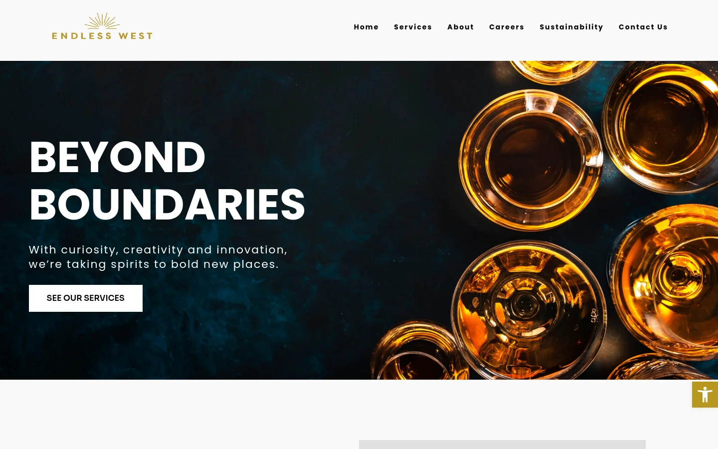 The desktop homepage features a dark, sophisticated hero section with an overhead view of amber-colored spirits in glasses against a dark background. A large white headline reads 'BEYOND BOUNDARIES' above a call-to-action button labeled 'SEE OUR SERVICES.' The navigation menu is positioned at the top right with links for Home, Services, About, Careers, Sustainability, and Contact Us.