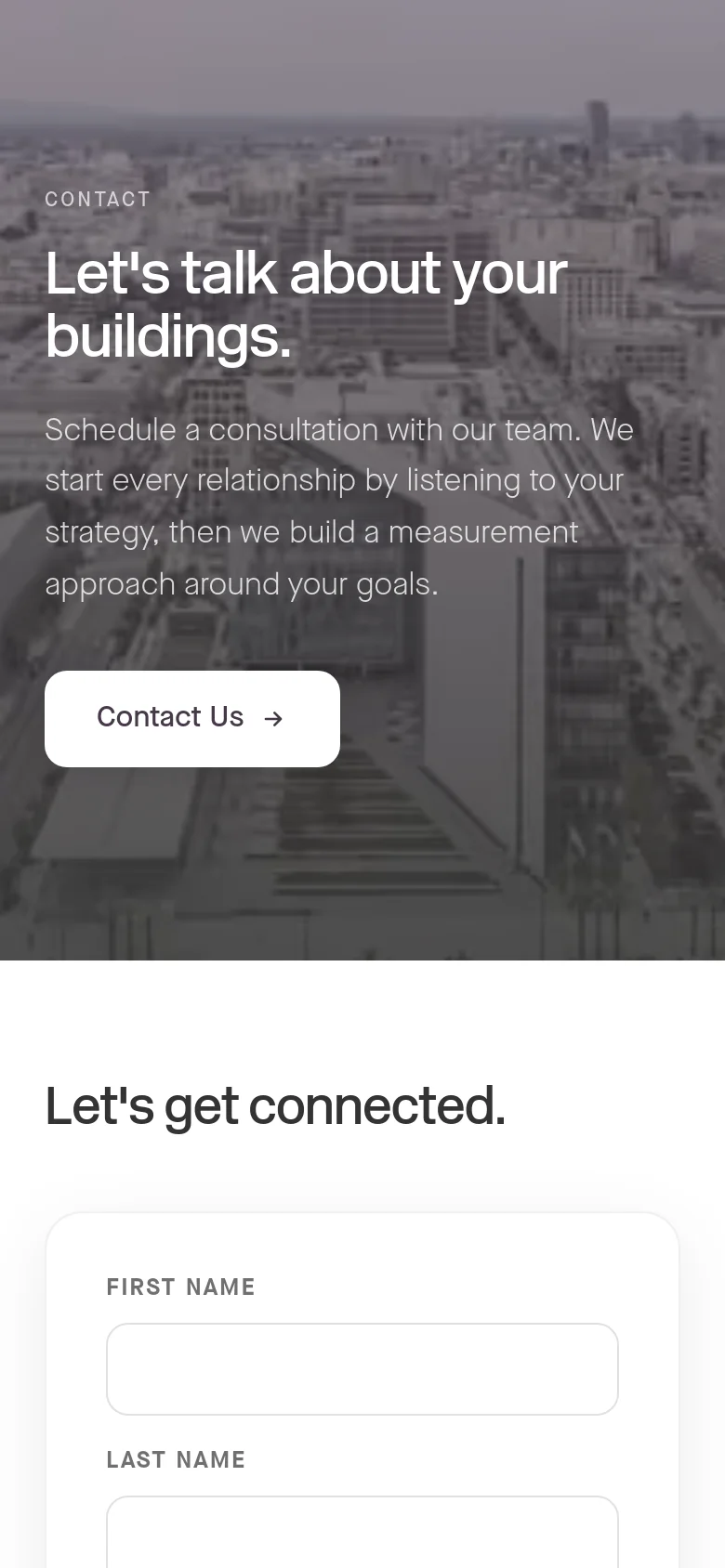 The mobile version maintains the grayscale cityscape hero image and text, but the layout is vertically stacked for a narrower screen. The headline and description are centered, and the contact form fields below appear larger and full-width to accommodate touch interaction.