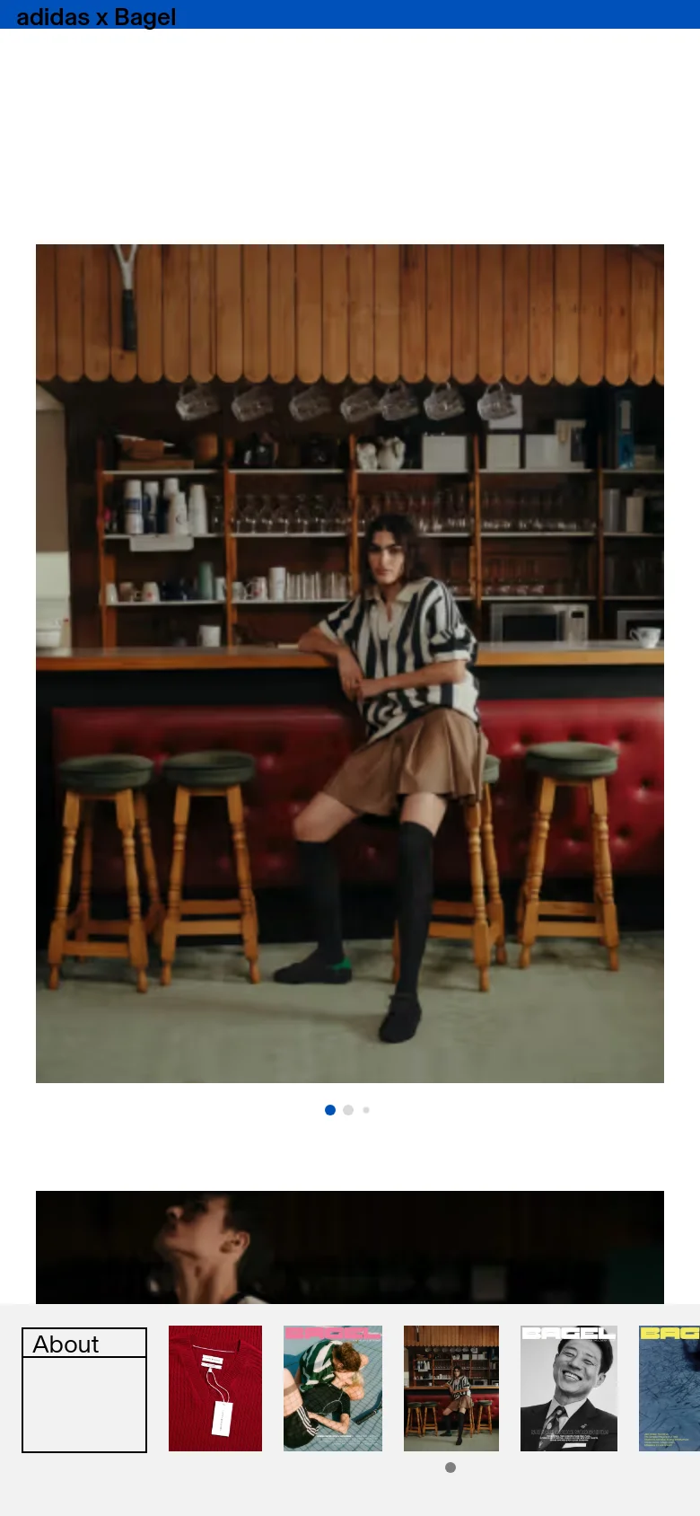The mobile version presents a vertically oriented layout, focusing on a single large image of a person in a cafe. The navigation elements are simplified, and the content is centered to accommodate a narrow screen, maintaining the clean aesthetic with ample white space.