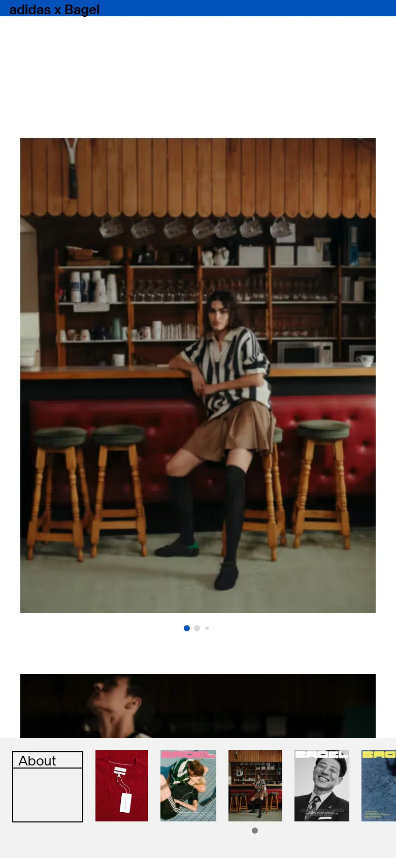 The mobile version presents a vertically oriented layout, focusing on a single large image of a person in a cafe. The navigation elements are simplified, and the content is centered to accommodate a narrow screen, maintaining the clean aesthetic with ample white space.