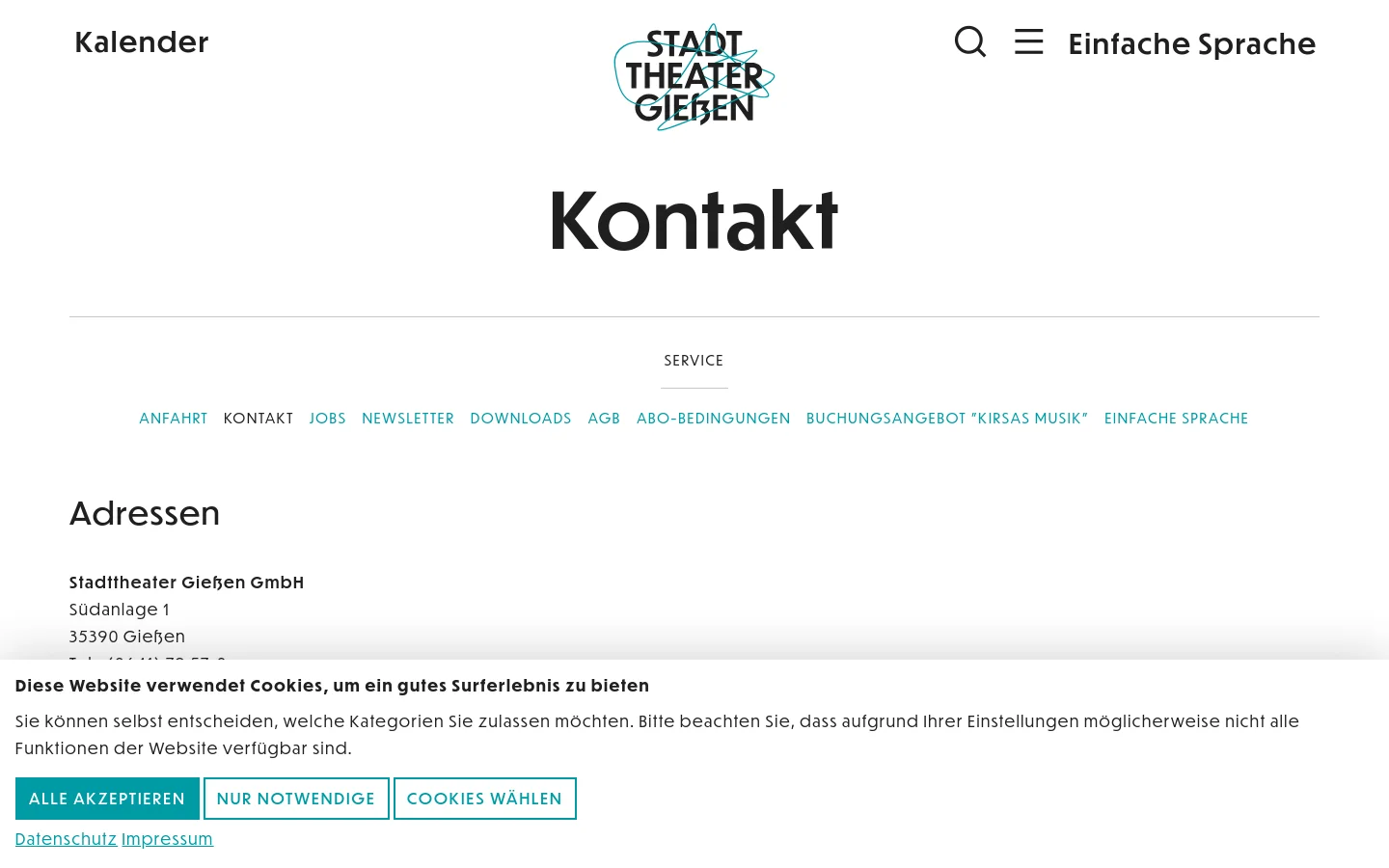 The desktop contact page features a clean white background with the Stadttheater Gießen logo centered at the top. Below the large 'Kontakt' headline, a horizontal service navigation menu provides links to various service pages. The main content area lists multiple contact addresses and departments in a structured text format.