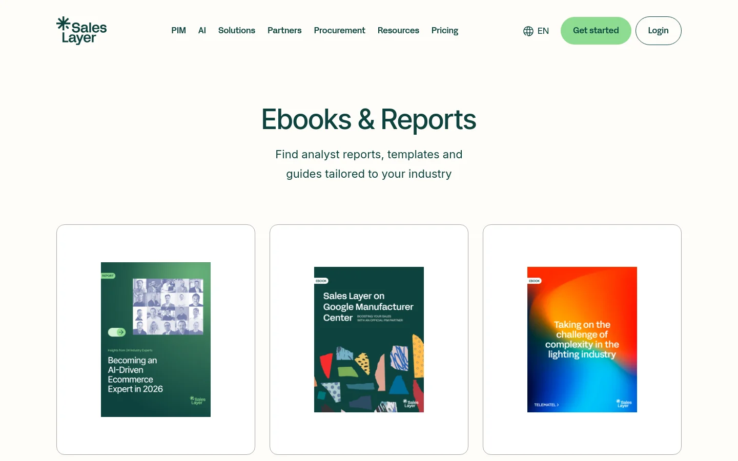 The desktop page features a clean white background with a centered headline reading 'Ebooks & Reports' and a subheadline about finding industry-tailored guides. Below the text, three large white cards are arranged in a horizontal row, each displaying a colorful ebook or report cover. The navigation bar at the top includes the Sales Layer logo, menu links like PIM and AI, a language selector, and 'Get started' and 'Login' buttons.