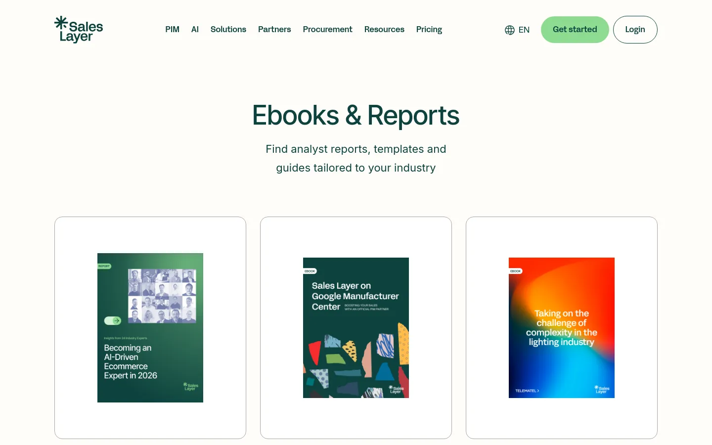 The desktop page features a clean white background with a centered headline reading 'Ebooks & Reports' and a subheadline about finding industry-tailored guides. Below the text, three large white cards are arranged in a horizontal row, each displaying a colorful ebook or report cover. The navigation bar at the top includes the Sales Layer logo, menu links like PIM and AI, a language selector, and 'Get started' and 'Login' buttons.