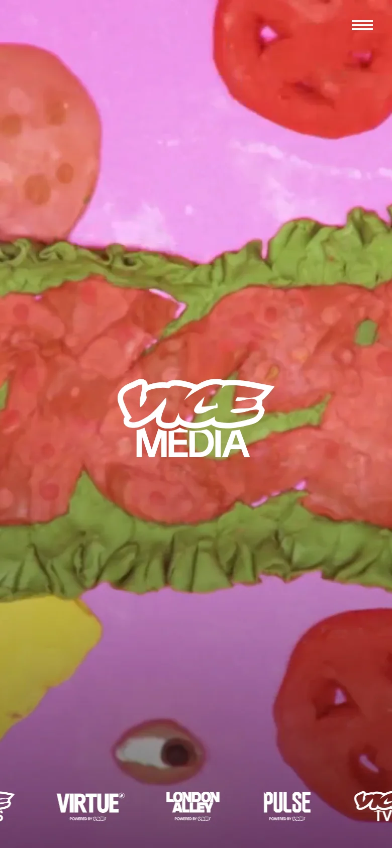 The mobile version presents a simplified, vertically oriented view of the brand's colorful aesthetic. The VICE Media logo is centered over a close-up, high-saturation image of food, with a hamburger menu icon at the top right and a single row of brand logos at the bottom.