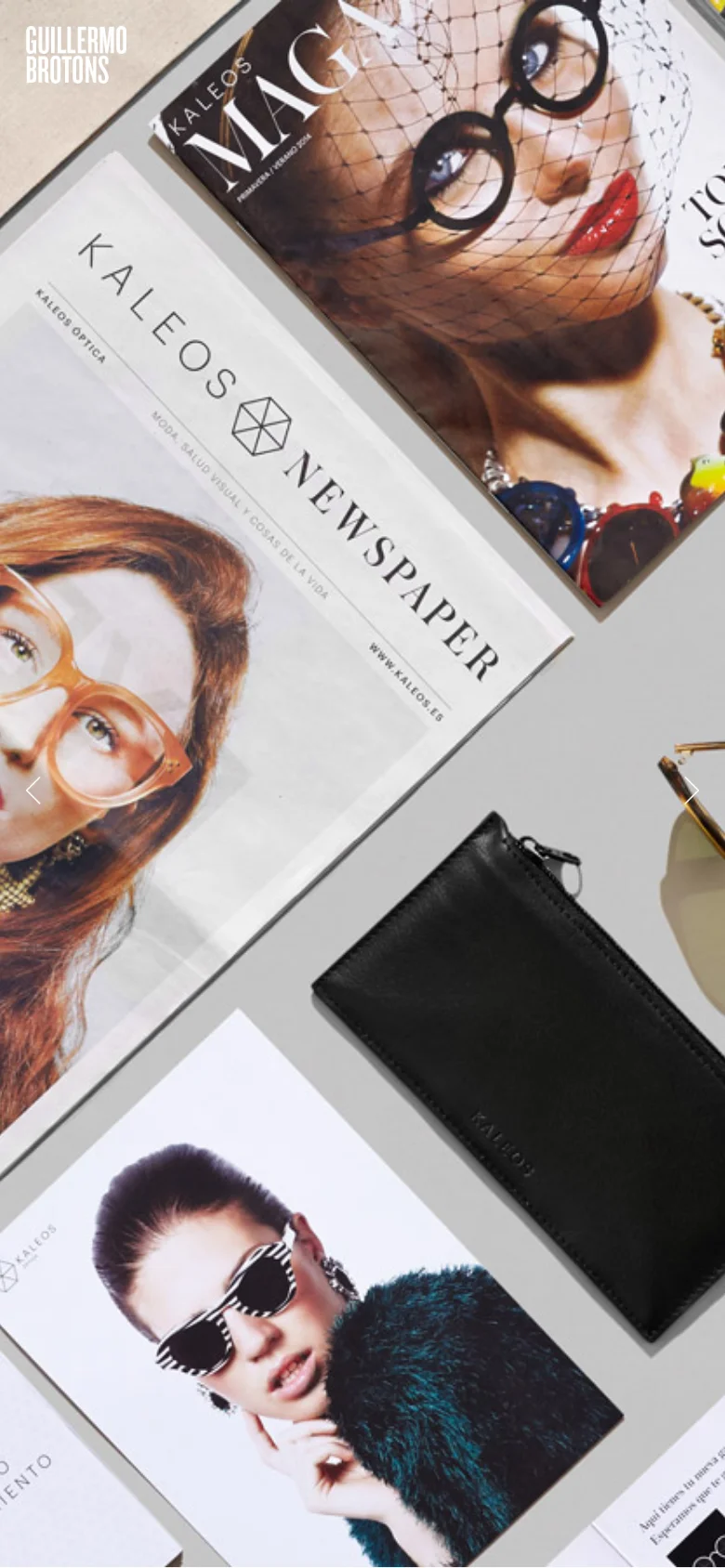 The mobile version maintains the same minimalist aesthetic but focuses on a vertically stacked view of the hero imagery. The large hero image of design publications is cropped to fit the narrow screen, and the text content is positioned below the visual elements for easier scrolling.