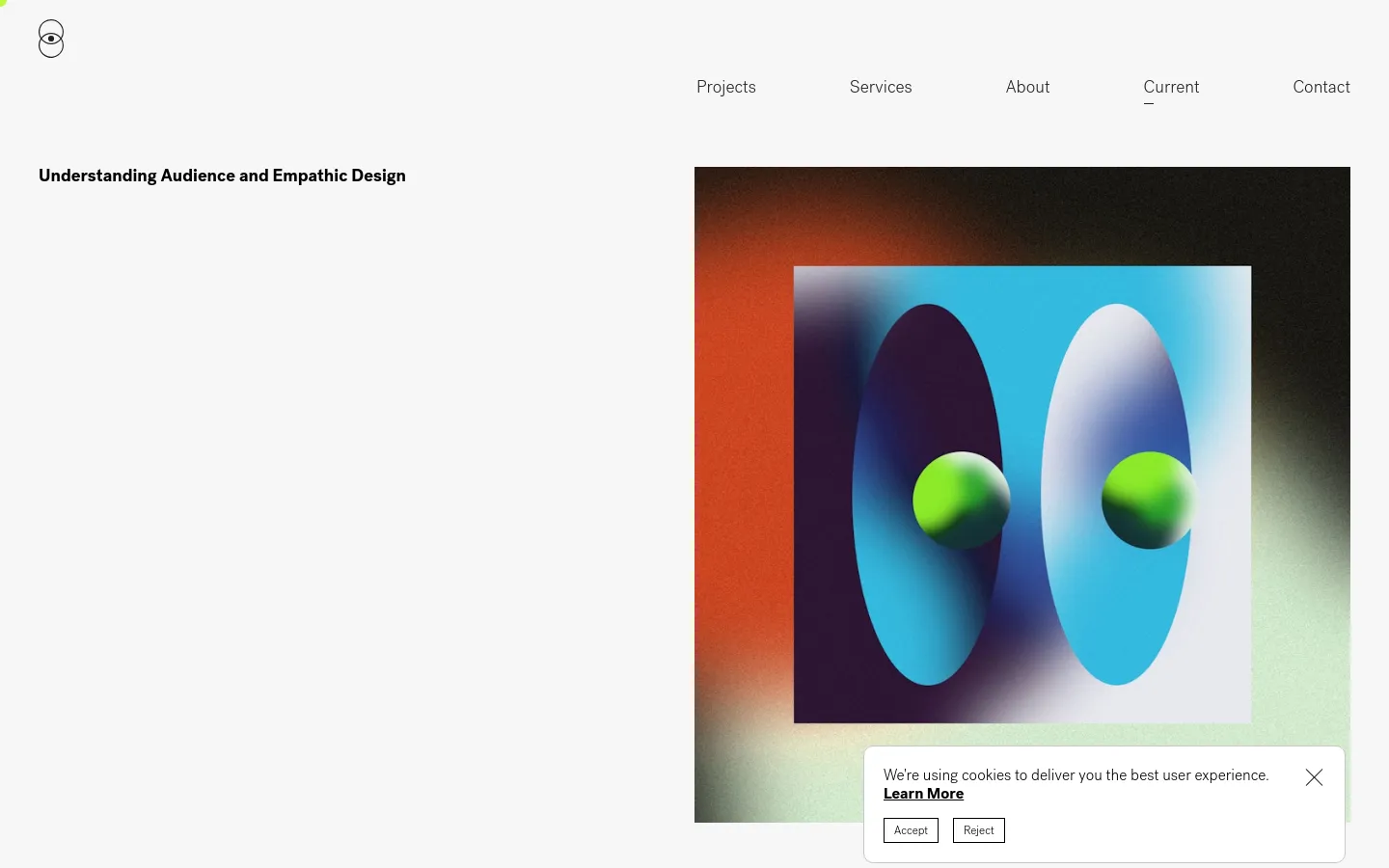 The desktop view shows a minimalist design blog page with a white background and a clean navigation menu at the top right. A large hero section features the headline 'Understanding Audience and Empathic Design' next to a large, abstract graphic of two blue oval shapes with green spheres. A cookie consent banner appears in the bottom right corner.