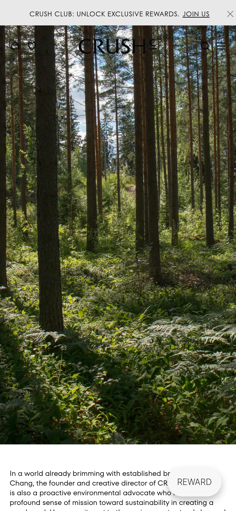 The mobile version presents a vertically stacked layout with the CRUSH logo at the top and a hamburger menu icon. The large forest hero image dominates the upper screen, followed by the brand's mission statement text. A floating 'REWARD' button is visible at the bottom right of the viewport.