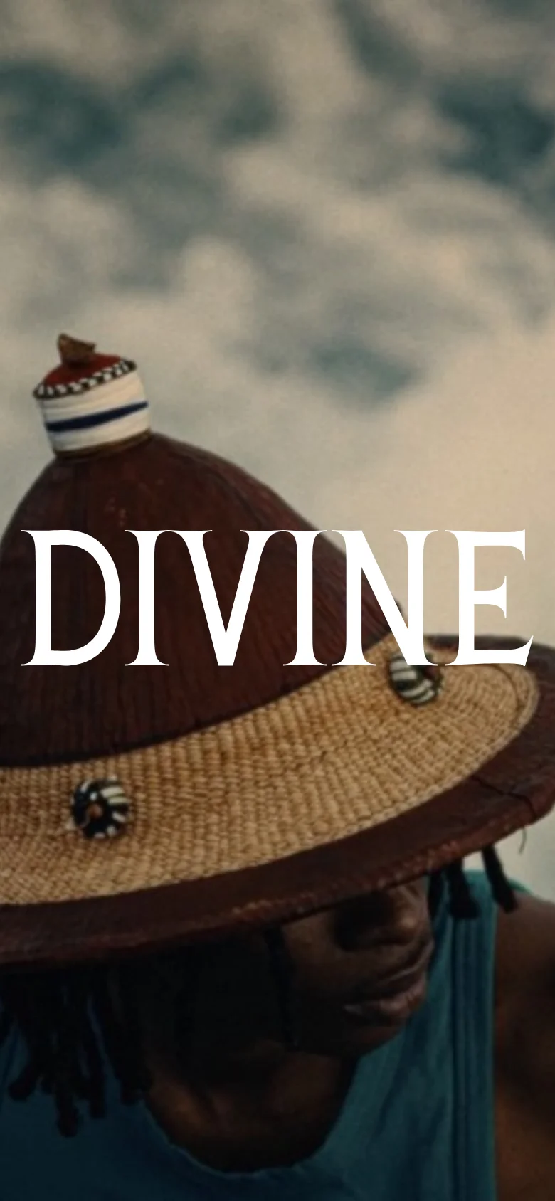 The mobile version presents a vertically oriented hero image showing a close-up of a person wearing a wide-brimmed straw hat with 'DIVINE' overlaid in large white text. The contact details and founder information follow in a single-column stacked layout, maintaining the minimalist aesthetic of the desktop site.