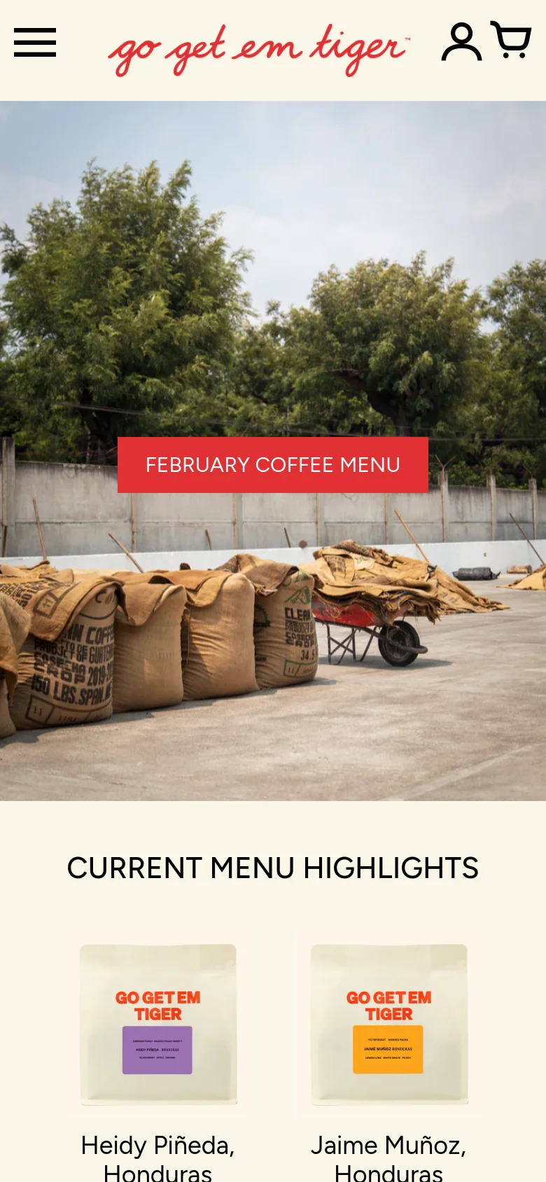 The mobile version maintains the hero image and 'FEBRUARY COFFEE MENU' button but scales the layout for a vertical view. The 'CURRENT MENU HIGHLIGHTS' section shifts to a single-column stack, showing one coffee product at a time with its image and description. The navigation menu is condensed into a hamburger icon at the top left.