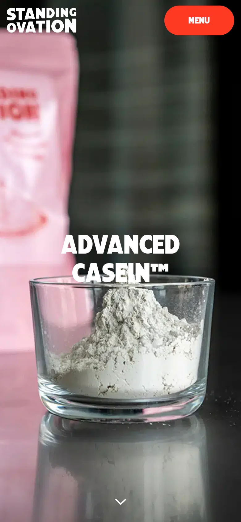 The mobile version simplifies the layout, removing the top navigation bar and replacing it with a large orange 'MENU' button. The hero image of the white powder and pink package remains the central focus, with the 'ADVANCED CASEIN™' headline centered over the image. A small white downward arrow at the bottom indicates more content is available below the fold.