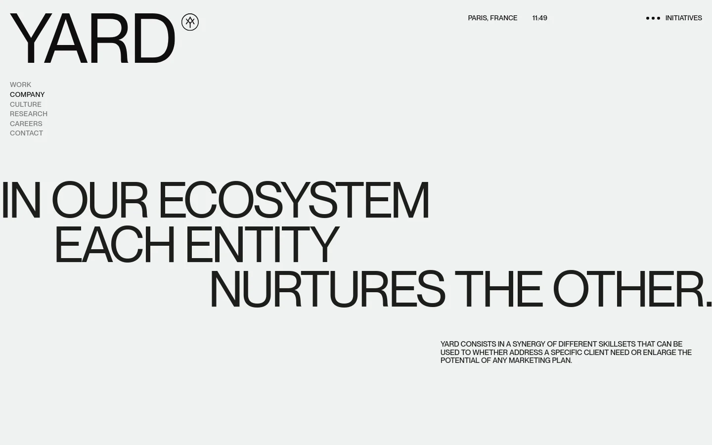 The desktop version features a minimalist design with a large black YARD logo and a vertical navigation menu on the left. A massive, bold headline reads 'IN OUR ECOSYSTEM EACH ENTITY NURTURES THE OTHER' against a light gray background, with a descriptive paragraph positioned in the lower right.