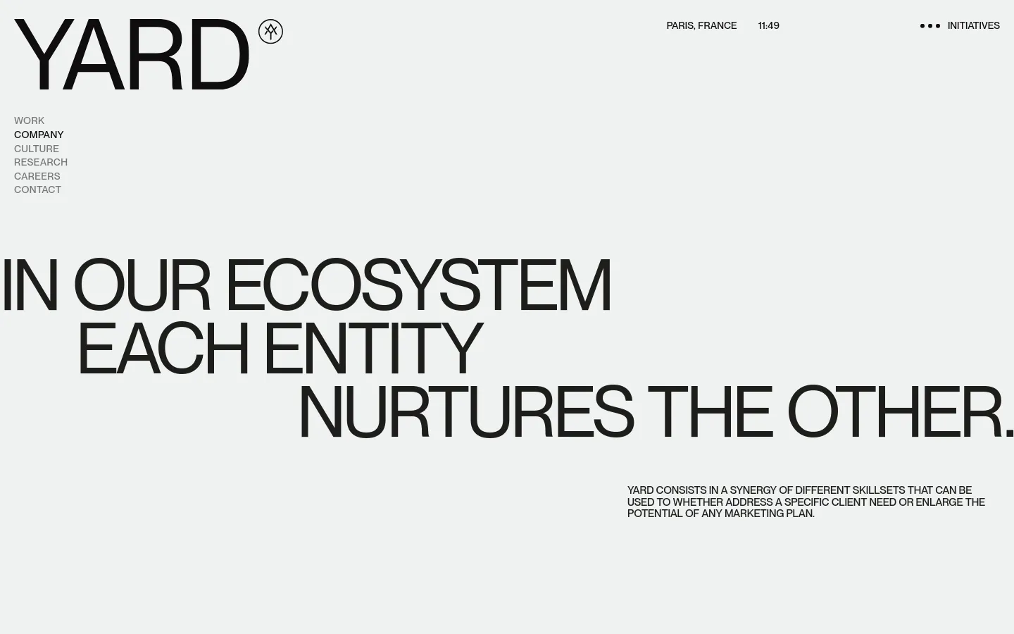 The desktop version features a minimalist design with a large black YARD logo and a vertical navigation menu on the left. A massive, bold headline reads 'IN OUR ECOSYSTEM EACH ENTITY NURTURES THE OTHER' against a light gray background, with a descriptive paragraph positioned in the lower right.