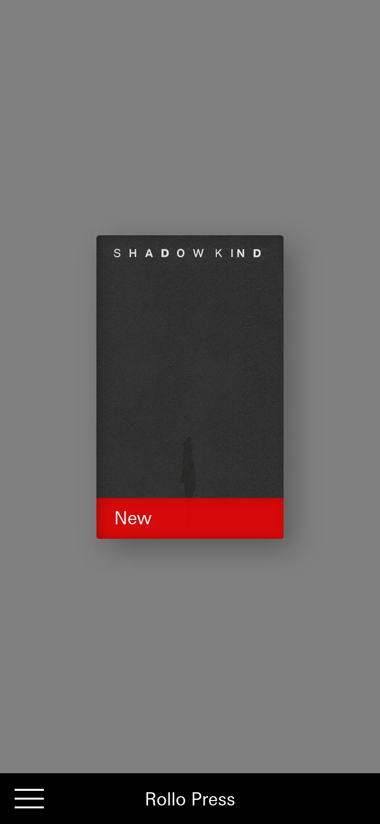 The mobile version maintains the minimalist aesthetic, displaying the same vertical 'SHADOWKIND' book cover with its red 'New' banner centered on a gray background. The layout is simplified for a vertical screen, with the black navigation bar remaining at the bottom containing the menu icon and site title.