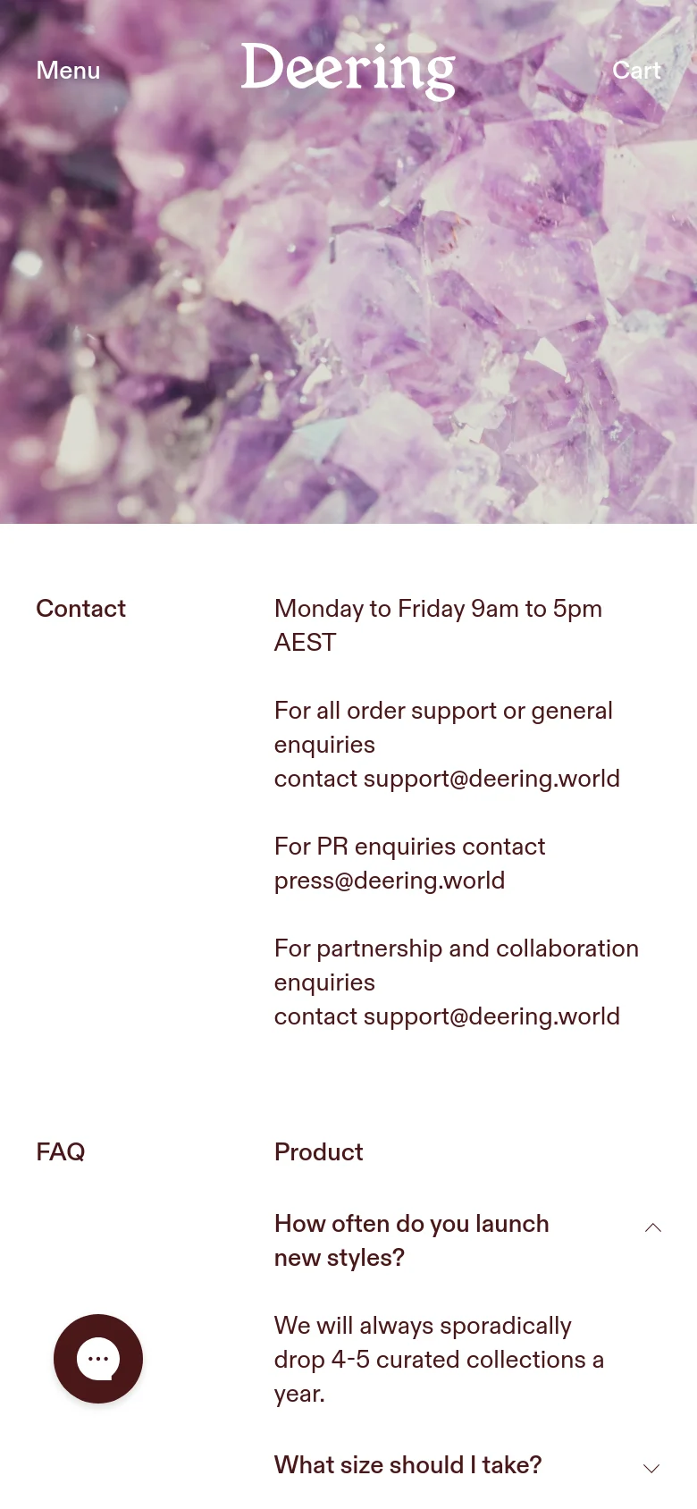The mobile version displays a vertically stacked layout starting with the amethyst crystal hero image and a centered Deering logo. The navigation is condensed into a 'Menu' button on the left and 'Cart' on the right. The contact details and FAQ sections follow below, presented in a single-column format for easier scrolling.