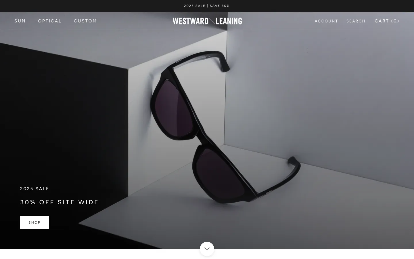 The desktop homepage features a minimalist design with a large hero image of black sunglasses resting on a geometric white and black surface. A top navigation bar includes links for Sun, Optical, and Custom, alongside Account, Search, and Cart. A prominent '2025 SALE' headline with '30% OFF SITE WIDE' and a white 'SHOP' button is overlaid on the hero image.